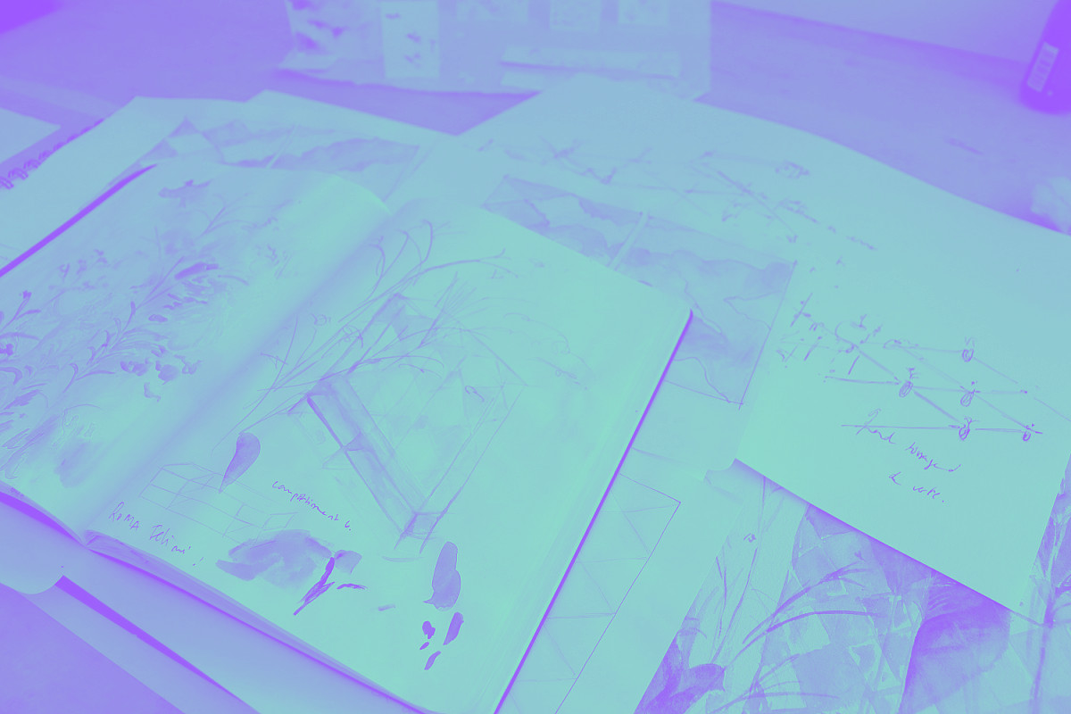 cahiers préparatoires avec des dessins à l'aquarelle